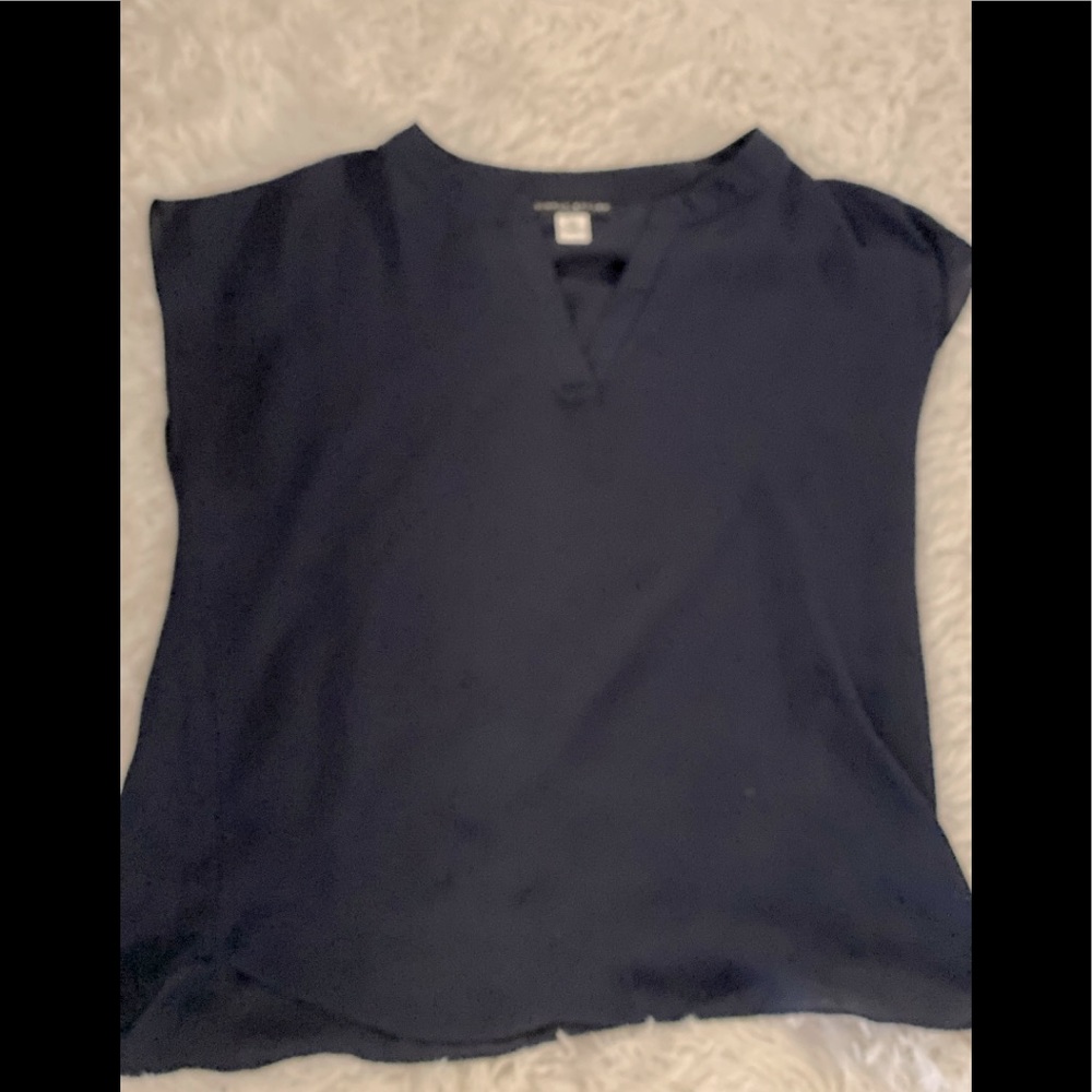 Simply styled women’s navy blue blouse.